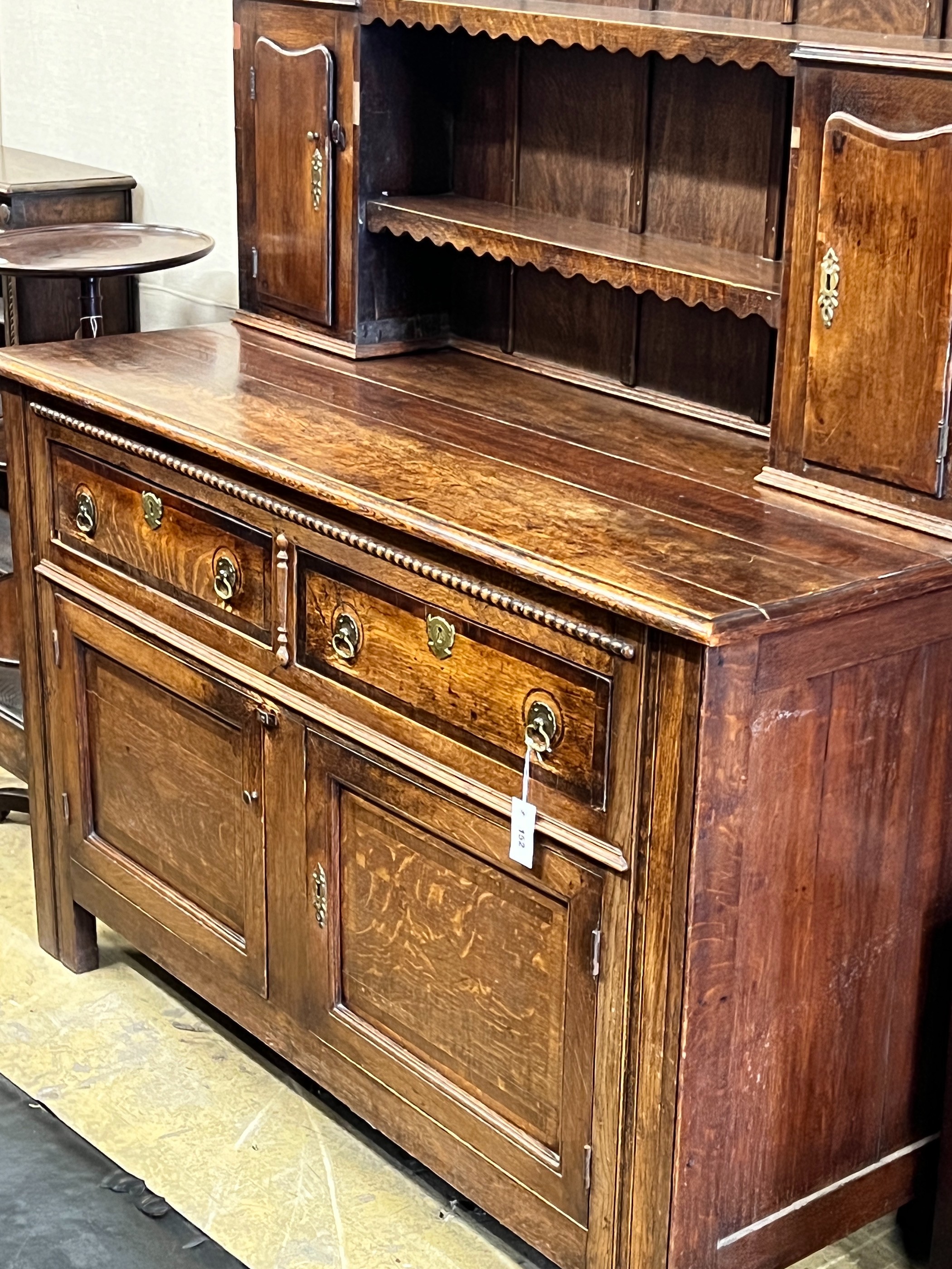 A Victorian oak dresser with boarded rack, width 148cm, depth 58cm, height 206cm